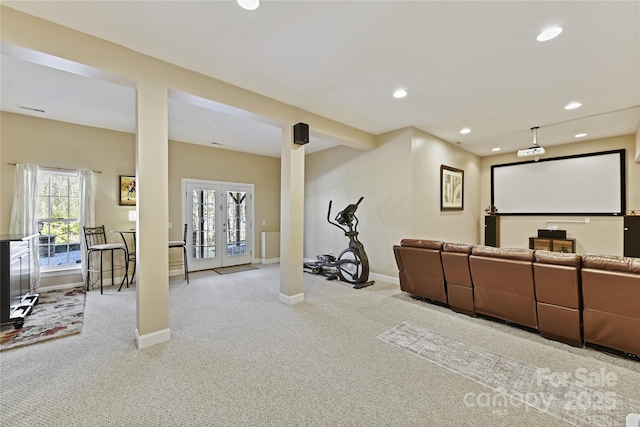 cinema room featuring recessed lighting, baseboards, carpet flooring, and french doors