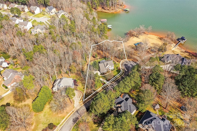 aerial view with a water view and a residential view