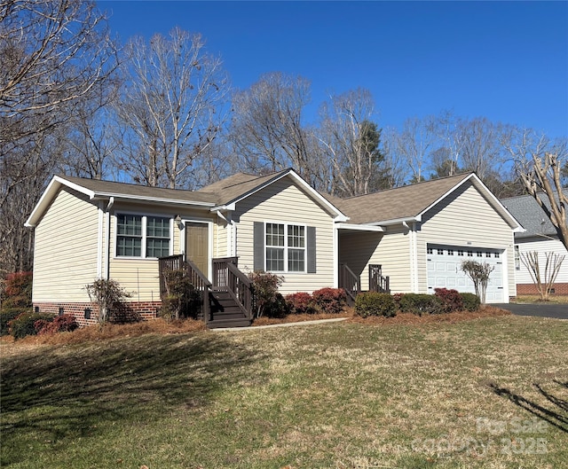 ranch-style home featuring a garage, a front lawn, crawl space, and aphalt driveway