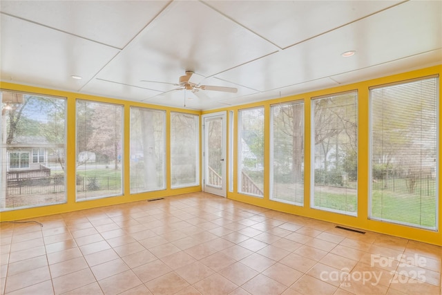 1007 Wentworth Dr, Kannapolis, NC 28081 - unfurnished sunroom with plenty of natural light, visible vents, and tile patterned flooring