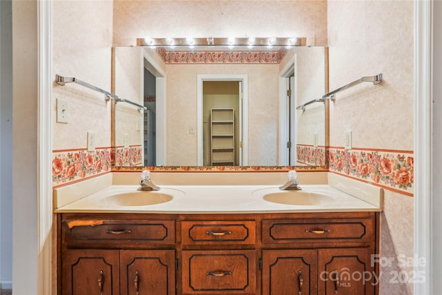 1007 Wentworth Dr, Kannapolis, NC 28081 - bathroom with a sink, double vanity, and wallpapered walls