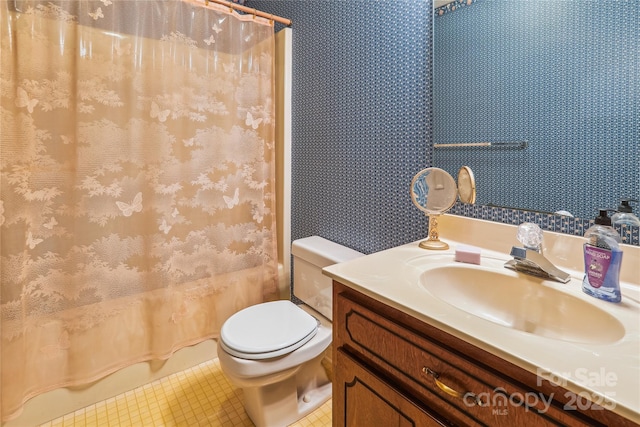 1007 Wentworth Dr, Kannapolis, NC 28081 - full bath with toilet, shower / bath combo with shower curtain, vanity, wallpapered walls, and tile patterned flooring