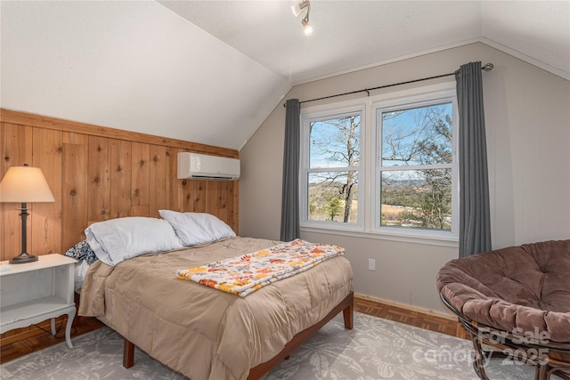 bedroom with lofted ceiling, a wall unit AC, wooden walls, and a textured ceiling