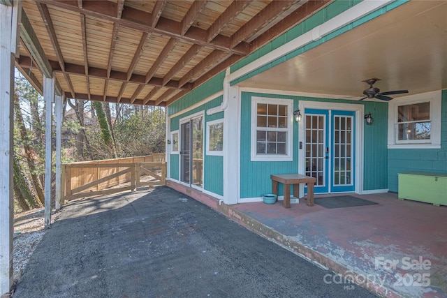 view of patio with ceiling fan and french doors