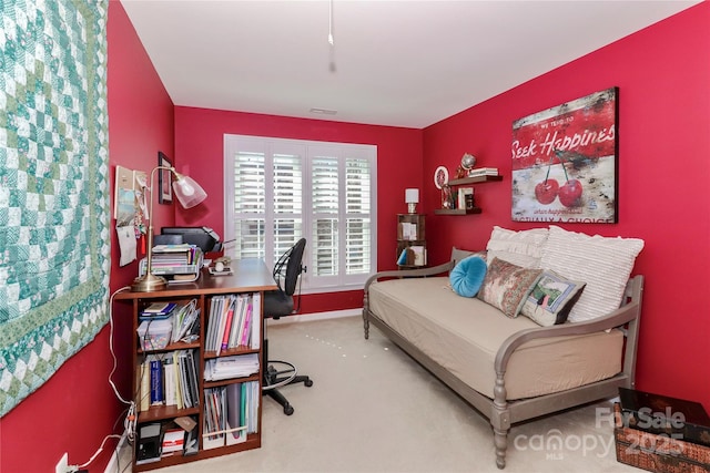 bedroom featuring baseboards and carpet flooring