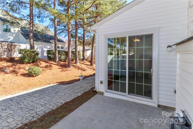 exterior space with a patio area and fence