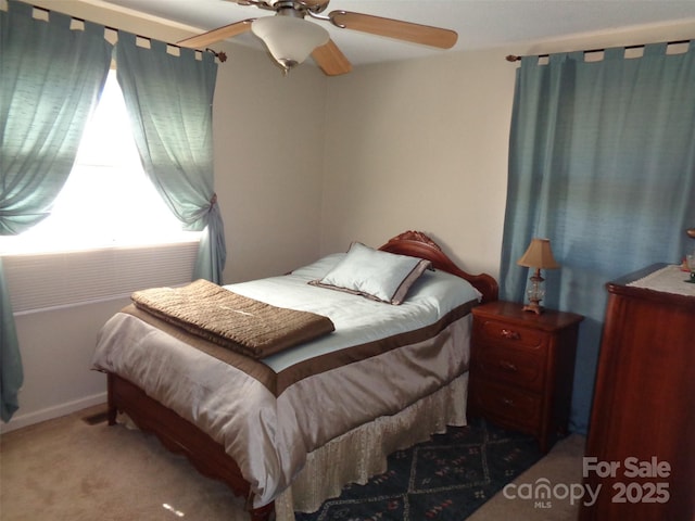 bedroom featuring carpet and ceiling fan