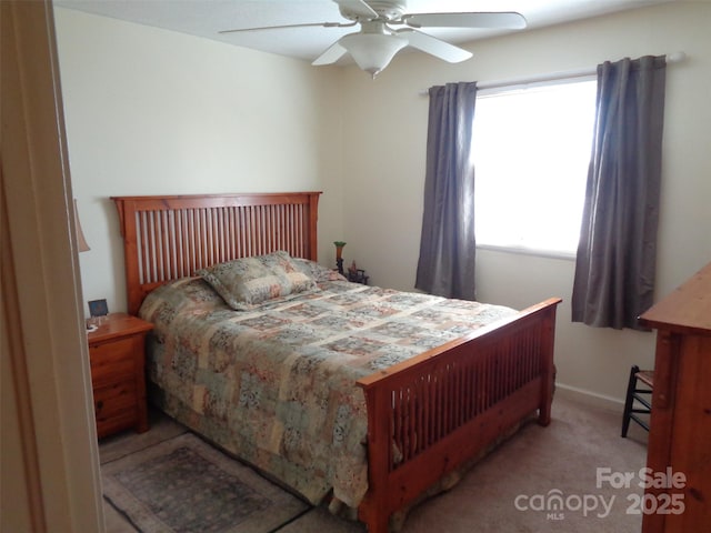 carpeted bedroom featuring a ceiling fan