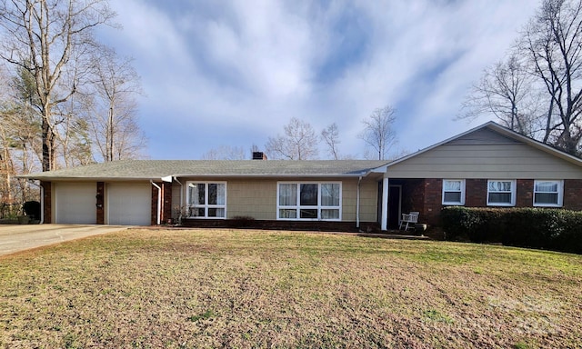 single story home featuring a front lawn, an attached garage, brick siding, and a chimney