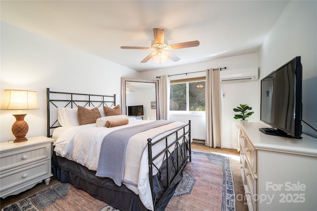 carpeted bedroom featuring ceiling fan, a baseboard heating unit, and a wall mounted air conditioner