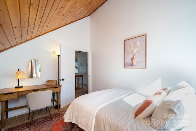 bedroom with wood ceiling and vaulted ceiling