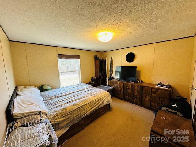 bedroom with a textured ceiling, crown molding, and light colored carpet