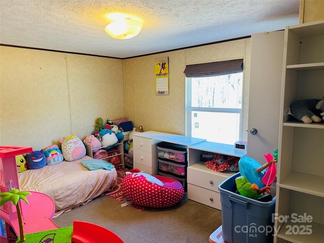 carpeted bedroom featuring a textured ceiling