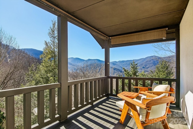 balcony featuring a mountain view