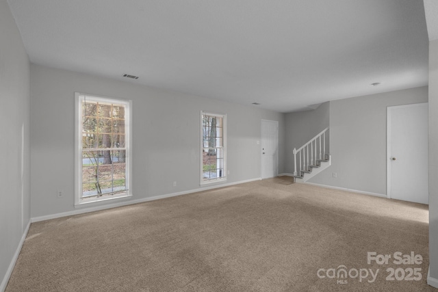 5948 Deveron Dr, Charlotte, NC 28211 - unfurnished room with carpet flooring, baseboards, stairway, and visible vents