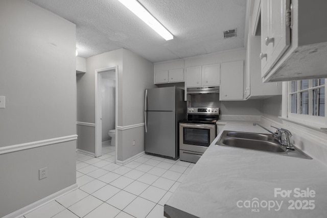 5948 Deveron Dr, Charlotte, NC 28211 - kitchen with light countertops, visible vents, stainless steel appliances, under cabinet range hood, and a sink