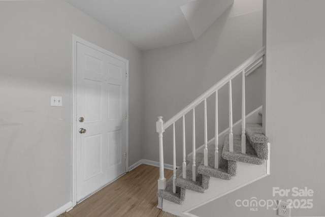 5948 Deveron Dr, Charlotte, NC 28211 - entrance foyer featuring baseboards, stairs, and wood finished floors