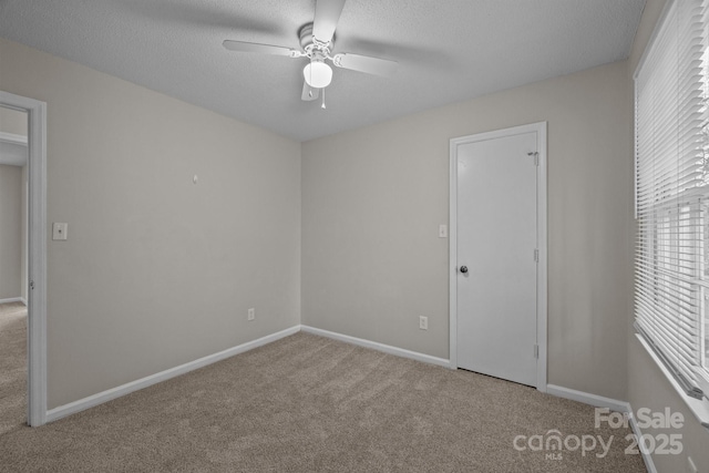 5948 Deveron Dr, Charlotte, NC 28211 - unfurnished bedroom with baseboards, carpet floors, and a textured ceiling