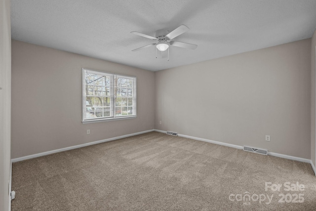 5948 Deveron Dr, Charlotte, NC 28211 - unfurnished room with baseboards, carpet floors, ceiling fan, and visible vents