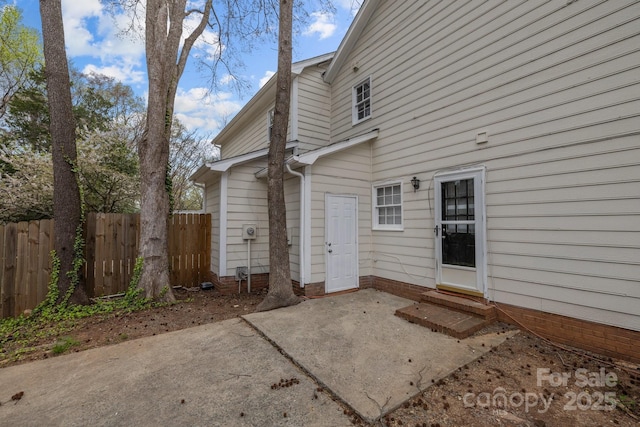 5948 Deveron Dr, Charlotte, NC 28211 - back of property featuring a patio area, entry steps, and fence