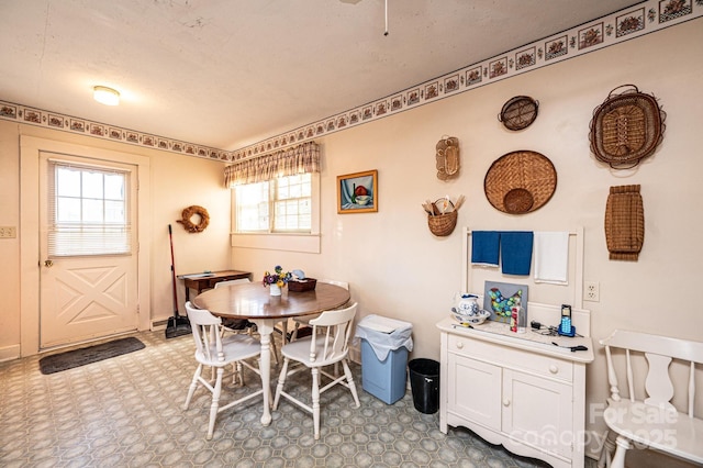 dining room featuring light floors