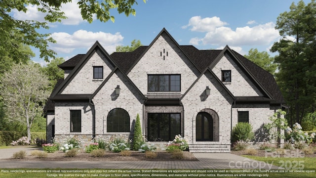 view of front of house featuring brick siding