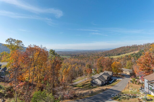 bird's eye view featuring a forest view