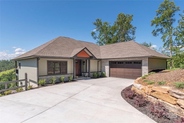 54 Herron View Ln, Weaverville, NC 28787 - view of front of home featuring a shingled roof, an attached garage, and concrete driveway