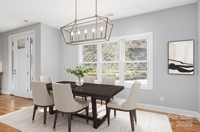 54 Herron View Ln, Weaverville, NC 28787 - dining area featuring light wood-type flooring and a chandelier