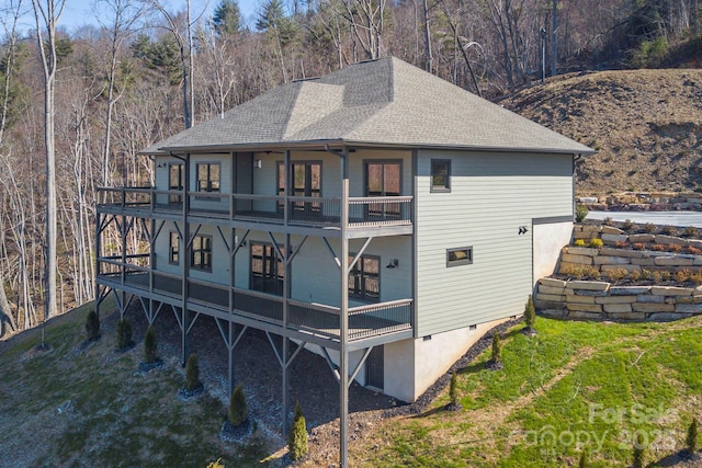 54 Herron View Ln, Weaverville, NC 28787 - rear view of property with a balcony, roof with shingles, crawl space, and a lawn