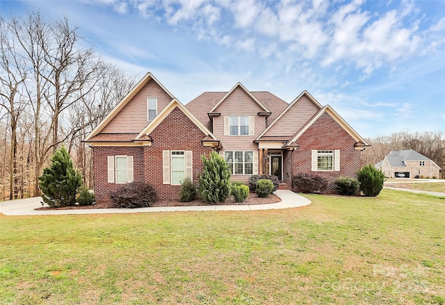 craftsman inspired home with brick siding and a front lawn