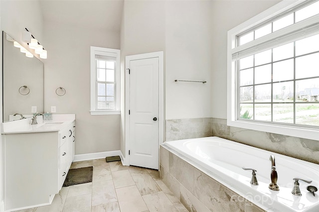 bathroom featuring a bath and vanity