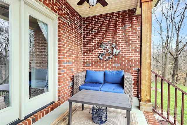 balcony featuring ceiling fan