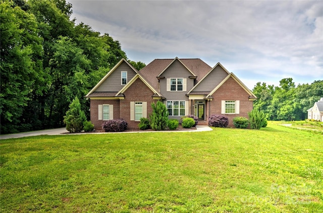 1011 Duntov Dr, Monroe, NC 28110 - craftsman-style house featuring brick siding and a front yard