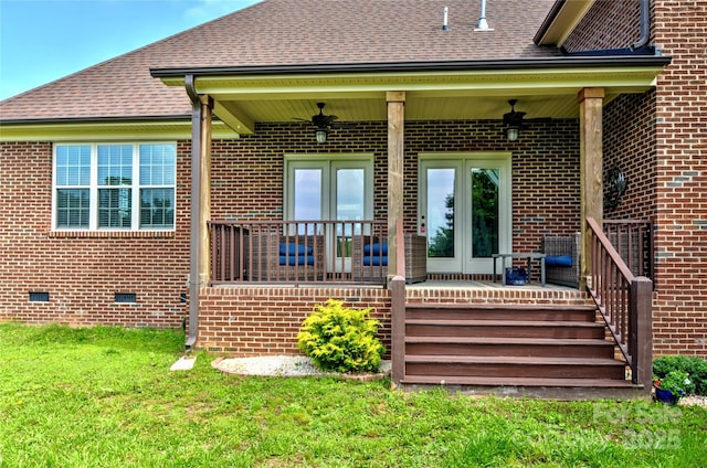 1011 Duntov Dr, Monroe, NC 28110 - back of house featuring french doors, brick siding, a ceiling fan, a lawn, and roof with shingles