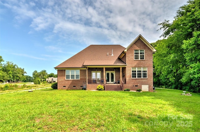 1011 Duntov Dr, Monroe, NC 28110 - back of property with crawl space, a yard, brick siding, a deck, and french doors