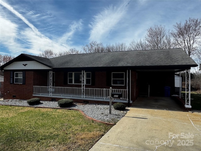 single story home featuring brick siding, roof with shingles, concrete driveway, covered porch, and crawl space