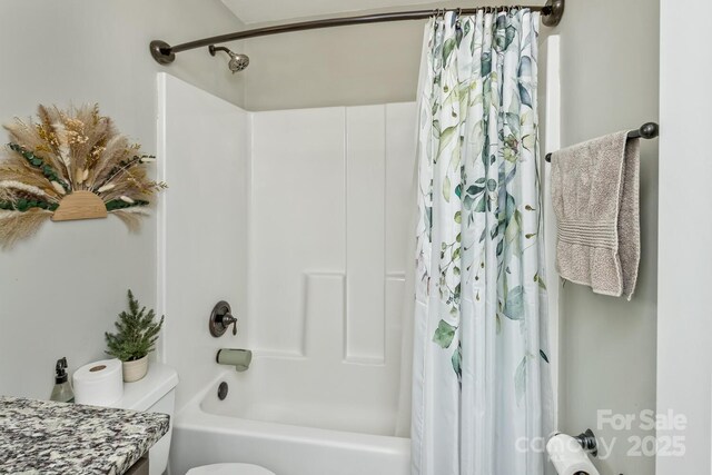 full bath featuring shower / tub combo and toilet