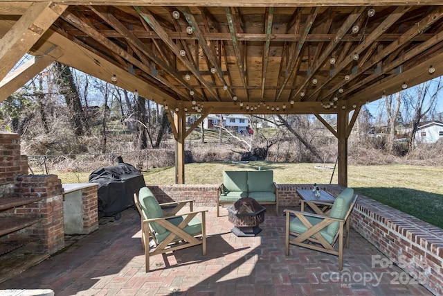 view of patio / terrace featuring an outdoor hangout area and fence