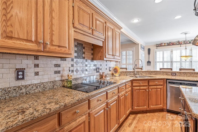 5101 Belicourt Dr, Charlotte, NC 28277 - kitchen with dishwasher, light stone counters, black electric stovetop, crown molding, and a sink
