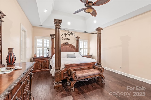 5101 Belicourt Dr, Charlotte, NC 28277 - bedroom featuring decorative columns, baseboards, a raised ceiling, dark wood-type flooring, and recessed lighting