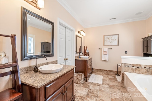 5101 Belicourt Dr, Charlotte, NC 28277 - bathroom featuring ornamental molding, two vanities, a sink, and a bath