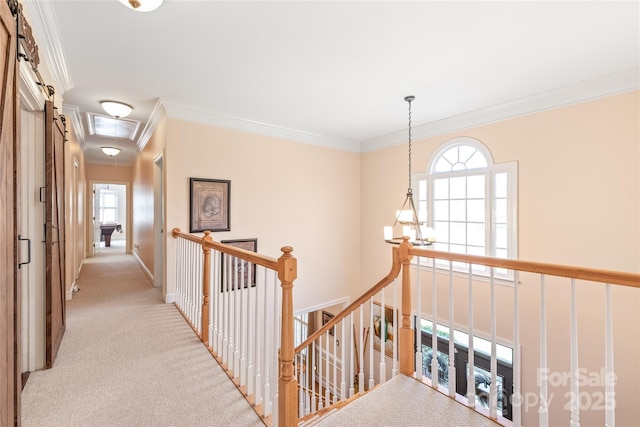 5101 Belicourt Dr, Charlotte, NC 28277 - hallway featuring crown molding, light colored carpet, visible vents, attic access, and an upstairs landing