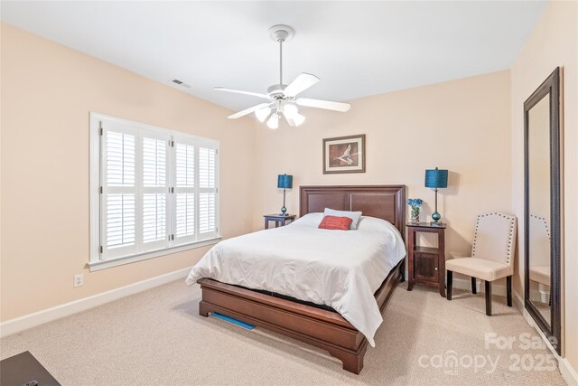 5101 Belicourt Dr, Charlotte, NC 28277 - bedroom with a ceiling fan, visible vents, light carpet, and baseboards