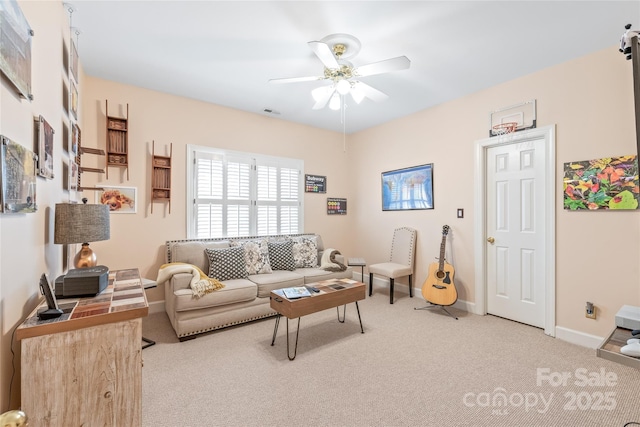5101 Belicourt Dr, Charlotte, NC 28277 - living room featuring light carpet, visible vents, baseboards, and a ceiling fan