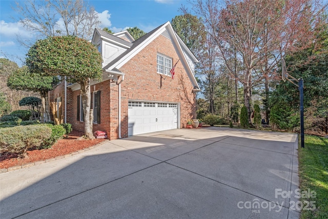 5101 Belicourt Dr, Charlotte, NC 28277 - view of side of home featuring a garage, concrete driveway, and brick siding