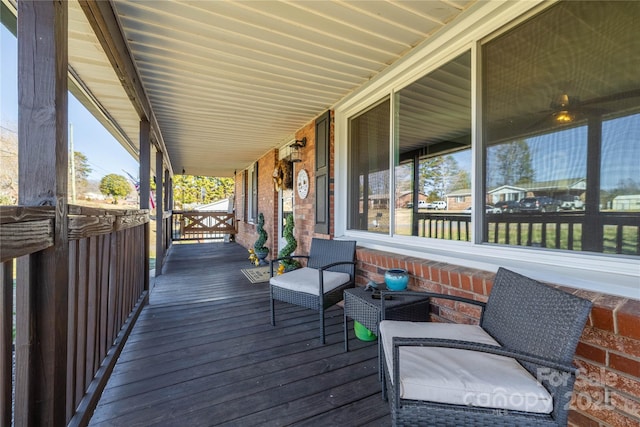 wooden deck featuring a porch