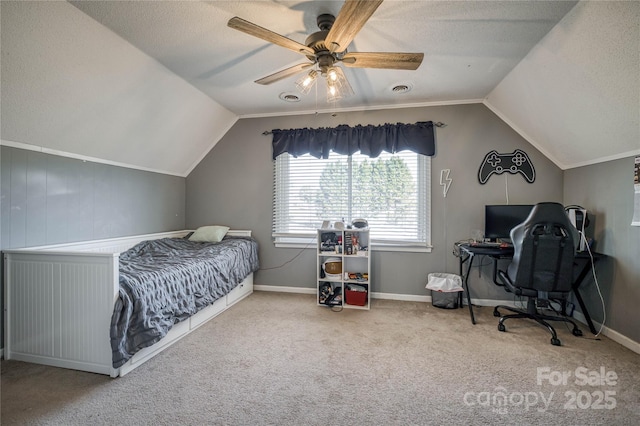 carpeted bedroom with a textured ceiling, visible vents, a ceiling fan, vaulted ceiling, and baseboards