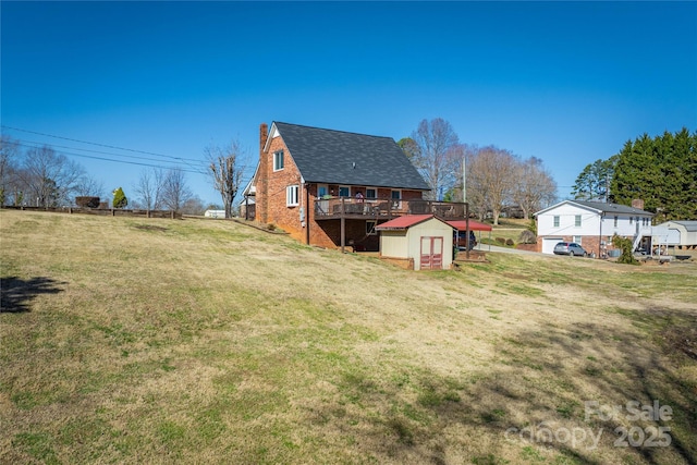 view of yard with a shed and an outdoor structure