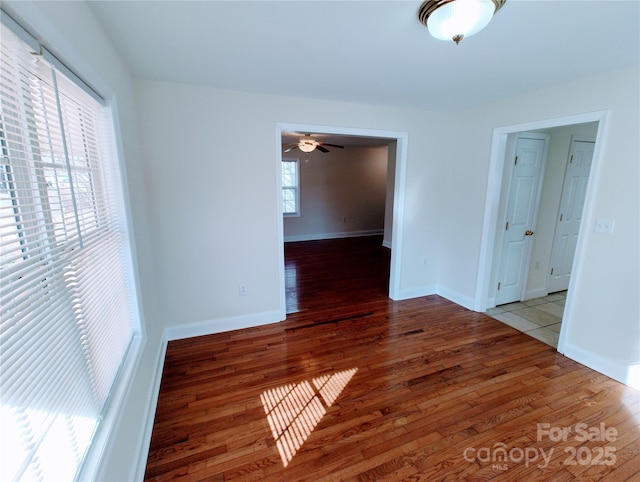 1806 Bringle Ferry Rd, Salisbury, NC 28146 - unfurnished room featuring ceiling fan, baseboards, and wood finished floors